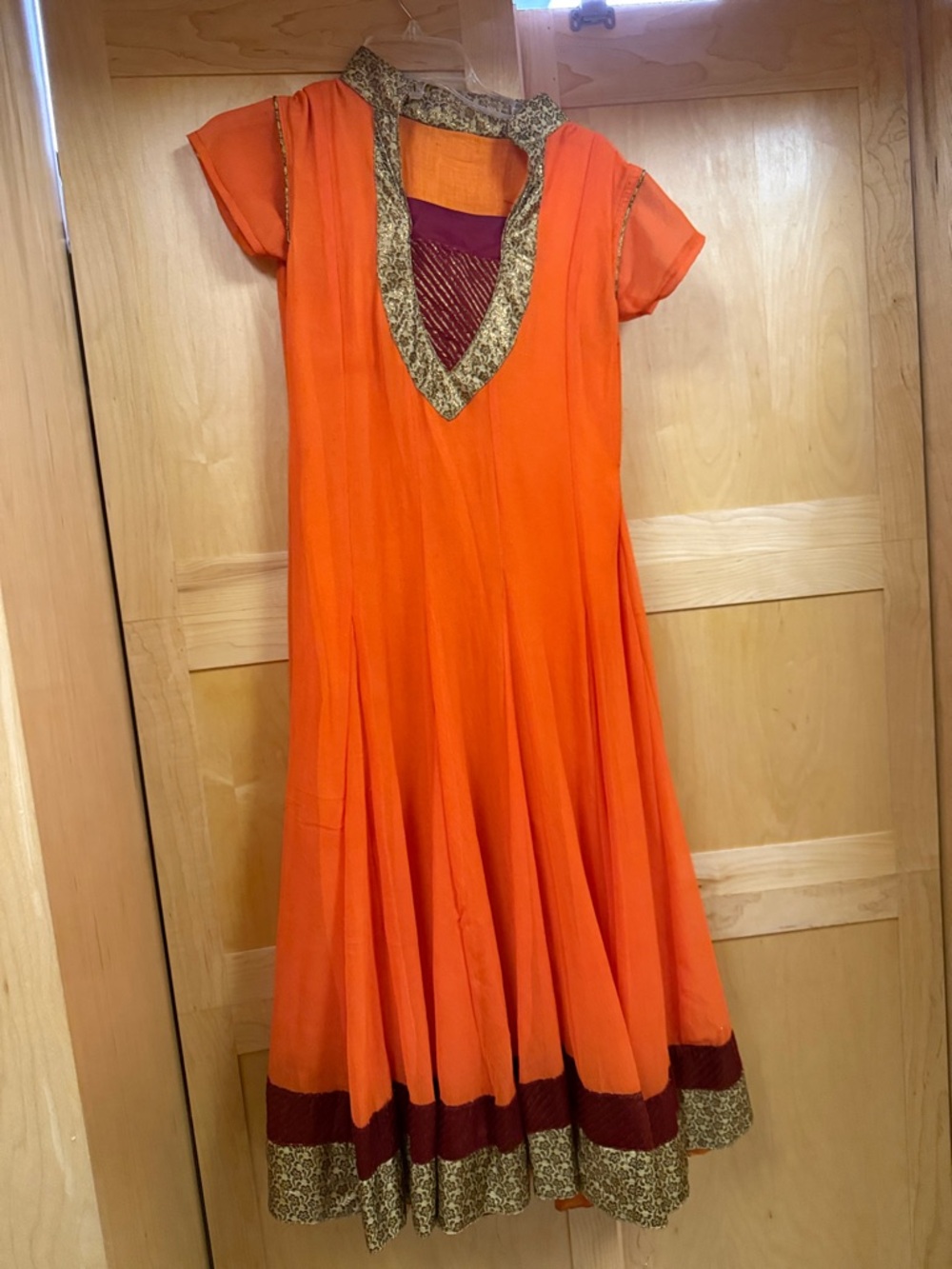Vibrant Orange Embroidered anarkali Dress with Maroon Accents
